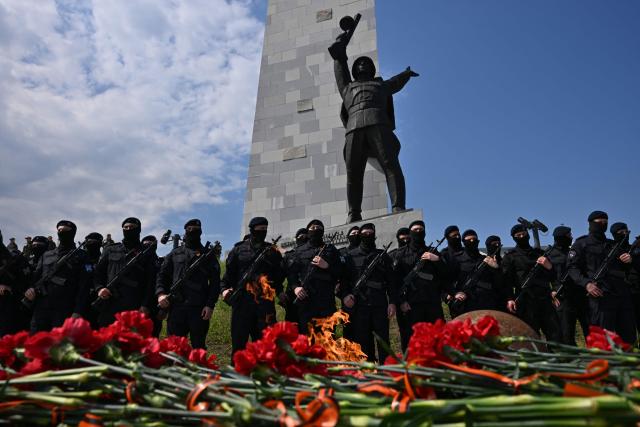 Russian servicemen of the Special Rapid Response Unit (SOBR) attend a ceremony marking the 81st anniversary of the victory over Nazi Germany in World War II at the Savur-Mohyla memorial in the Donetsk region, Russian-controlled Ukraine on May 8, 2026, amid the ongoing Russian-Ukrainian conflict. (Photo by AFP)