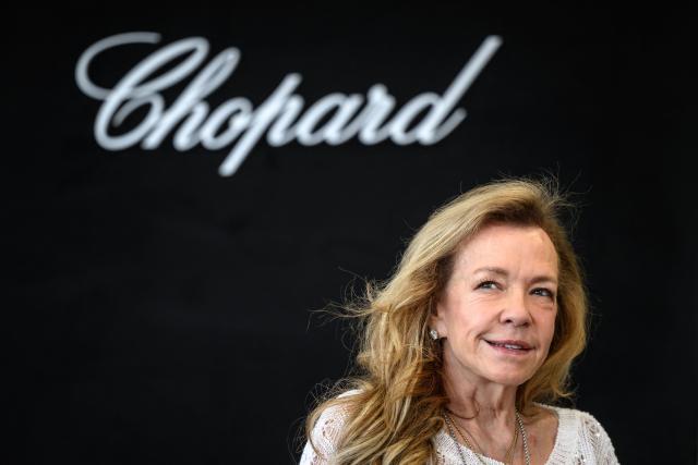 Swiss Jeweller's Chopard co-president and artistic director Caroline Scheufele poses at Chopard's high-jewelry workshops, in Meyrin near Geneva, on April 21, 2026. The Palme d'Or, the top prize at the Cannes Film Festival, takes more than 70 hours of meticulous craftsmanship to produce at Swiss jeweller Chopard's workshops outside Geneva. Since its creation in 1955, the Palme d'Or has constantly evolved. Its current form was conceived in 1998 by Caroline Scheufele, co-president of Chopard. (Photo by Fabrice COFFRINI / AFP)