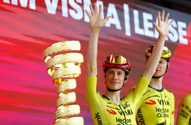 Team Visma Lease a Bike Danish rider Jonas Vingegaard waves during the presentation of the teams prior the start of the 2nd stage of the Giro d'Italia 2026 - Tour of Italy cycling race between Burgas and Veliko Tarnovo, Bulgaria, on May 9, 2026. (Photo by Luca Bettini / AFP)