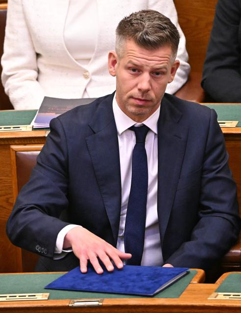 Hungary's incoming Prime Minister Peter Magyar reacts at the start of the inaugural session of the new Parliament and the ceremonial swearing in of representatives in Budapest on May 9, 2026. Hungarian parliament's inaugural session on May 9, 2026, will see a record number of women, accounting for more than a quarter of lawmakers, and more than a hundred deputies new to politics. (Photo by Attila KISBENEDEK / AFP)