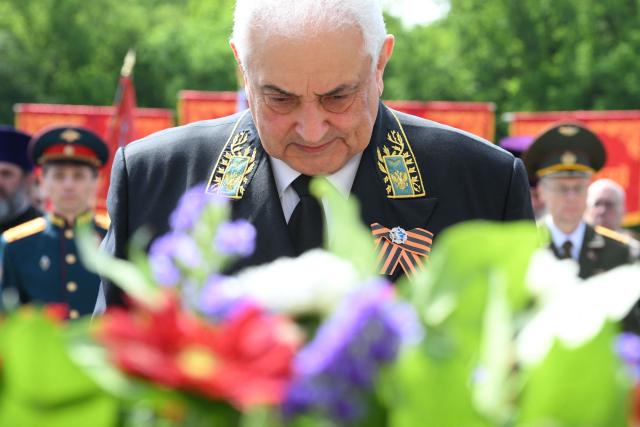 Russia's ambassador to Germany Sergey Nechayev lays a wreath at the Soviet War Memorial Tiergarten in Berlin on May 9, 2026 in commemoration of the 81st anniversary of the 1945 victory against Nazi Germany. (Photo by RALF HIRSCHBERGER / AFP)