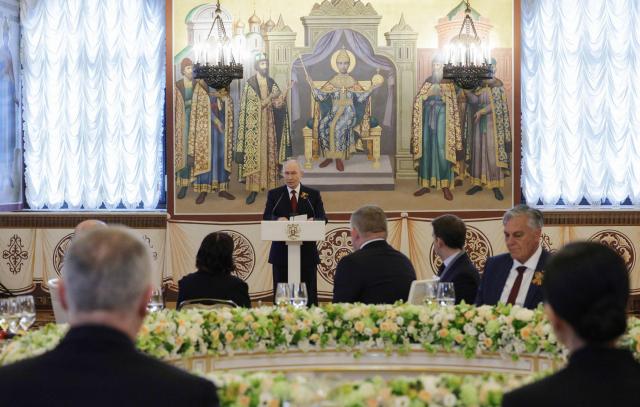 In this pool photograph distributed by the Russian state agency Sputnik, Russia's President Vladimir Putin hosts a reception for foreign leaders attending the Victory Day celebrations, at the Kremlin in Moscow on May 9, 2026. Russia celebrates the 81st anniversary of the Soviet Union's victory over Nazi Germany in World War Two (WWII). (Photo by Gavriil Grigorov / POOL / AFP)