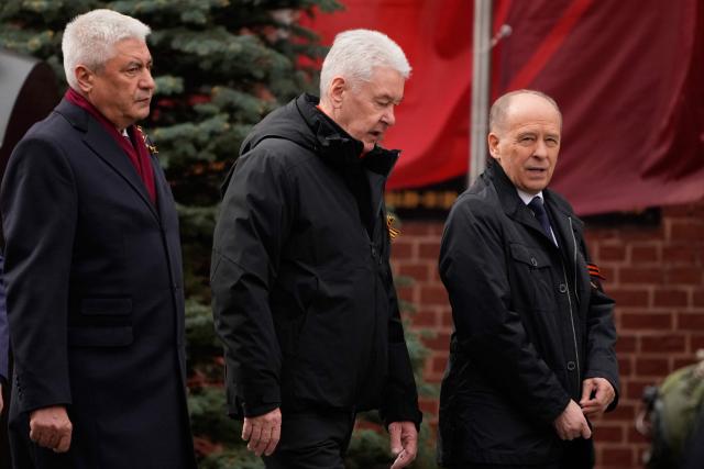 Russian Interior Minister Vladimir Kolokoltsev, Moscow Mayor Sergei Sobyanin and the Director of the Federal Security Service (FSB) Alexander Bortnikov attend the Victory Day military parade at Red Square in central Moscow on May 9, 2026. Russia celebrates the 81st anniversary of the Soviet Union's victory over Nazi Germany in World War Two (WWII). (Photo by Pavel Bednyakov / POOL / AFP)