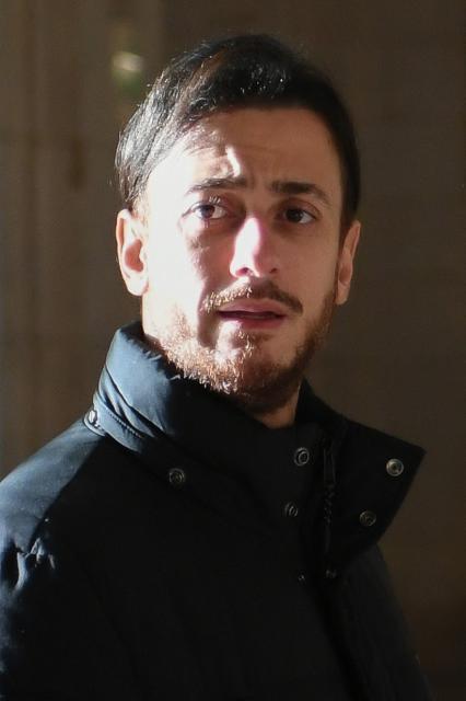 (FILES) Moroccan singer Saad Lamjarred arrives to appear in court for the opening of his trial, accused of allegedly raping a 20 year old woman in 2016, at the Assizes Court of Paris, on February 21, 2023. Moroccan singer Saad Lamjarred, already implicated in several cases of rape or sexual assault, is on trial before the Draguignan (Var) Assize Court for the rape, which he denies, of a barmaid in 2018 near Saint-Tropez. (Photo by Bertrand GUAY / AFP)