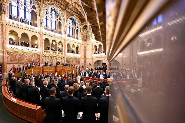 The incoming speaker of the Hungarian parliament Agnes Forsthoffer (C) is sworn in at the Hungarian parliament in Budapest on May 9, 2026. Pro-European conservative Peter Magyar will be officially sworn in as Prime Minister by the Hungarian parliament on May 9, 2026, just under a month after his landslide victory in the parliamentary elections against nationalist Viktor Orban. (Photo by Attila KISBENEDEK / AFP)