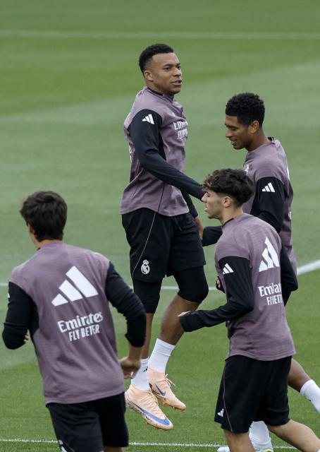 Real Madrid's French forward #10 Kylian Mbappe jumps during a training session on the eve of the Spanish league football match between FC Barcelona and Real Madrid CF, at Real Madrid Sports City in Valdebebas, in the outskirts of Madrid, on May 9, 2026. (Photo by OSCAR DEL POZO / AFP)