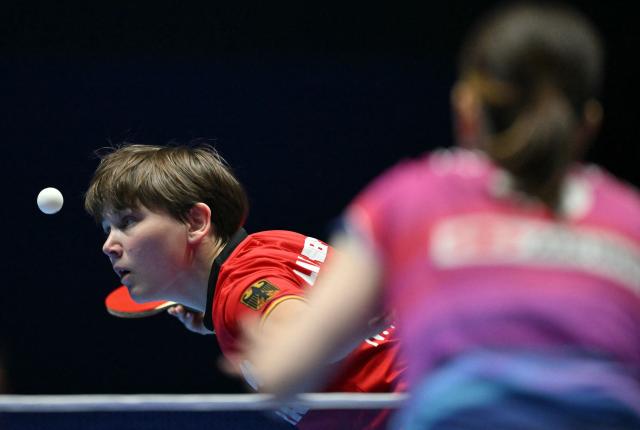 Germany's Nina Mittelham plays against Japan's Honoka Hashimoto during their Women's Teams semifinal match at the ITTF World Table Tennis Championships in Wembley Arena, west London on May 9, 2026. (Photo by Glyn KIRK / AFP)