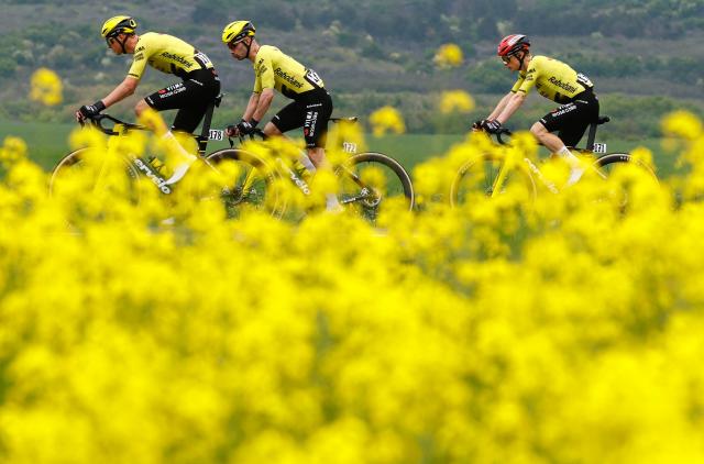 Team Visma Lease a Bike Danish rider Jonas Vingegaard (R) rides with Team Visma Lease a Bike Belgian rider Tim Rex (L) and Team Visma Lease a Bike Belgian rider Victor Campenaerts during the 2nd stage of the Giro d'Italia 2026 - Tour of Italy cycling race between Burgas and Veliko Tarnovo, Bulgaria, on May 9, 2026. (Photo by Luca Bettini / AFP)