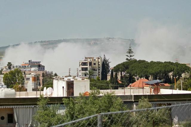 This photograph taken from the southern Lebanese area of Nabatieh shows smoke rising from the site of an Israeli strike that targeted the village of Habbouch on May 9, 2026. Lebanon said at least one person was killed in Israeli strikes on the country's south on May 9 despite a ceasefire with Hezbollah, after Israel's army issued an evacuation warning to several villages. (Photo by Abbas FAKIH / AFP)