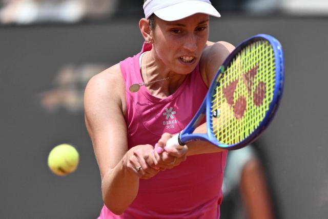 Belgium's Elise Mertens hits a return to Italy's Jasmine Paolini during the WTA Rome Open tennis tournament at Foro Italico in Rome on May 9, 2026. (Photo by Tiziana FABI / AFP)