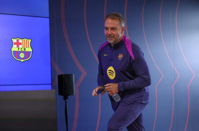 Barcelona's German coach Hans-Dieter Flick arrives to give a press conference on the eve of the Spanish league football match between FC Barcelona and Real Madrid CF at Camp Nou Stadium in Barcelona on May 9, 2026. (Photo by Lluis GENE / AFP)