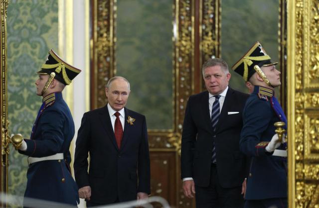 Russian President Vladimir Putin and Slovak Prime Minister Robert Fico attend a meeting in Moscow on May 9, 2026. (Photo by Ramil Sitdikov / POOL / AFP)