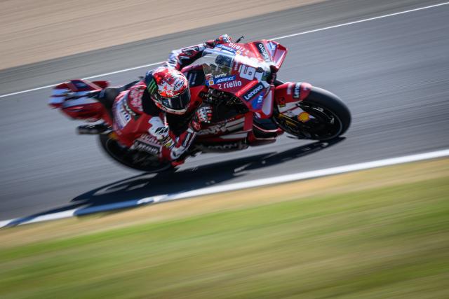 TOPSHOT - Ducati Lenovo Team's Italian rider Francesco Bagnaia corners during the qualifying session of the Moto GP Grand Prix of France at Le Mans, northwestern France, on May 9, 2026. The Ducati Lenovo Team Italian rider qualified in Pole Position. (Photo by Loic VENANCE / AFP)