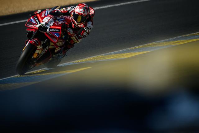 Ducati Lenovo Team's Italian rider Francesco Bagnaia corners during the qualifying session of the Moto GP Grand Prix of France at Le Mans, northwestern France, on May 9, 2026. The Ducati Lenovo Team Italian rider qualified in Pole Position. (Photo by Loic VENANCE / AFP)