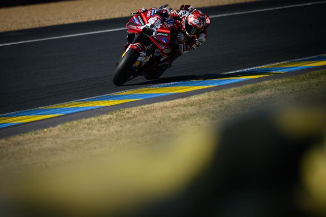Ducati Lenovo Team's Italian rider Francesco Bagnaia corners during the qualifying session of the Moto GP Grand Prix of France at Le Mans, northwestern France, on May 9, 2026. The Ducati Lenovo Team Italian rider qualified in Pole Position. (Photo by Loic VENANCE / AFP)