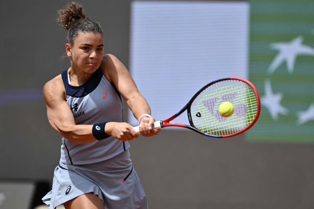 Italy's Jasmine Paolini hits a return to Belgium's Elise Mertens during the WTA Rome Open tennis tournament at Foro Italico in Rome on May 9, 2026. (Photo by Tiziana FABI / AFP)