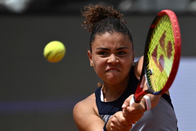Italy's Jasmine Paolini hits a return to Belgium's Elise Mertens during the WTA Rome Open tennis tournament at Foro Italico in Rome on May 9, 2026. (Photo by Tiziana FABI / AFP)