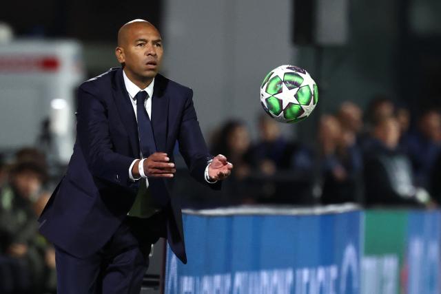 (FILES) Paris Saint-Germain's Brazilian coach Paulo Cesar throws the ball during the UEFA Women's Champions League first round day 2 football match between Paris Saint-Germain (PSG) and Real Madrid at the Campus Paris Saint-Germain in Poissy, western Paris on October 16, 2025. Having qualified for the French Women’s Cup final on May 10, 2026 in Valenciennes  against Lyon, Paris SG have turned things around after a difficult start of the season, during which the team was “undergoing a rebuild” and “lacked desire”, as manager Paulo Cesar, in his first season in charge of the Parisian side, he explained to AFP during an interview. (Photo by FRANCK FIFE / AFP)