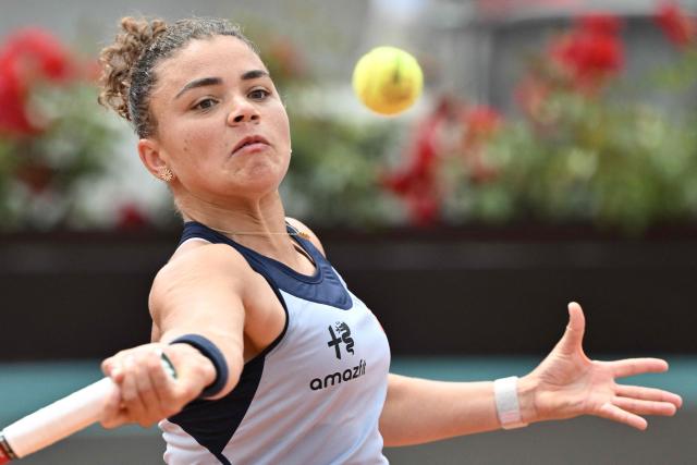 Italy's Jasmine Paolini hits a return to Belgium's Elise Mertens during the WTA Rome Open tennis tournament at Foro Italico in Rome on May 9, 2026. (Photo by Tiziana FABI / AFP)