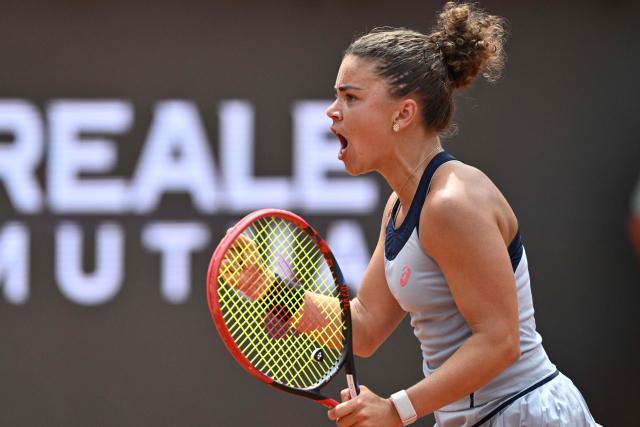 Italy's Jasmine Paolini celebrates a point against Belgium's Elise Mertens during the WTA Rome Open tennis tournament at Foro Italico in Rome on May 9, 2026. (Photo by Tiziana FABI / AFP)