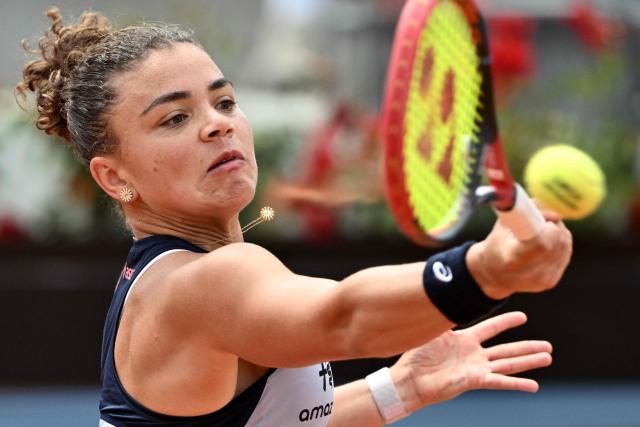 Italy's Jasmine Paolini hits a return to Belgium's Elise Mertens during the WTA Rome Open tennis tournament at Foro Italico in Rome on May 9, 2026. (Photo by Tiziana FABI / AFP)