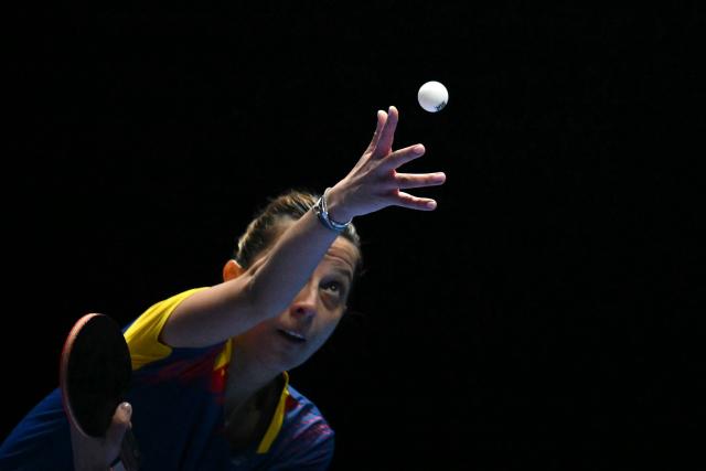 Romania's Elizabeta Samara serves against China's Sun Yingsha during their Women's Teams semi-final match at the ITTF World Table Tennis Championships in Wembley Arena, west London on May 9, 2026. (Photo by Glyn KIRK / AFP)