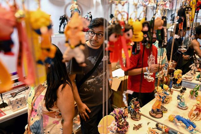 Fans attend the Mumbai Comic Con 2026 festival in Mumbai on May 9, 2026. (Photo by Indranil MUKHERJEE / AFP)