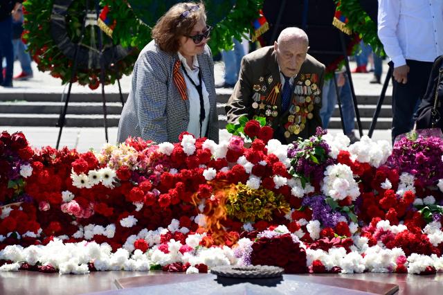 World War Two veteran Nerses Simonyan, 102, attends a ceremony marking the 81st anniversary of the victory over Nazi Germany in World War II, in Yerevan on May 9, 2026. (Photo by KAREN MINASYAN / AFP)
