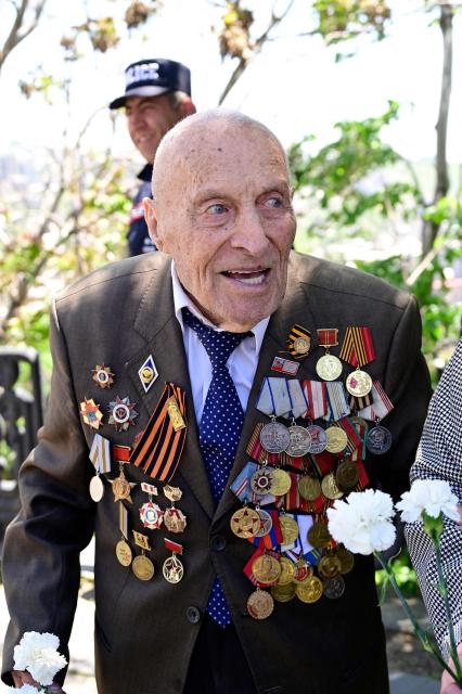 World War Two veteran Nerses Simonyan, 102, attends a ceremony marking the 81st anniversary of the victory over Nazi Germany in World War II, in Yerevan on May 9, 2026. (Photo by KAREN MINASYAN / AFP)