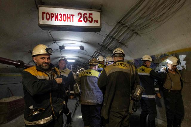 Ukrainian miners prepare for work at a coal mine operated by Ukrainian energy provider DTEK at an undisclosed location in the Dnipropetrovsk region on May 5, 2026, amid the Russian invasion of Ukraine. (Photo by Serhii Okunev / AFP)