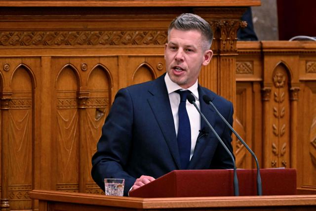 Hungary's incoming Prime Minister Peter Magyar delivers a speech during his swearing-in ceremony at the Hungarian parliament in Budapest on May 9, 2026. Pro-European conservative Peter Magyar will be officially sworn in as Prime Minister by the Hungarian parliament on May 9, 2026, just under a month after his landslide victory in the parliamentary elections against nationalist Viktor Orban. (Photo by Attila KISBENEDEK / AFP)