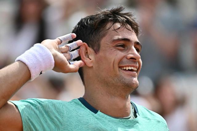 Argentine's Mariano Navone celebrates after winning the first set against Canada's Felix Auger Aliassime during the ATP Rome Open tennis tournament at Foro Italico in Rome on May 9, 2026. (Photo by Filippo MONTEFORTE / AFP)