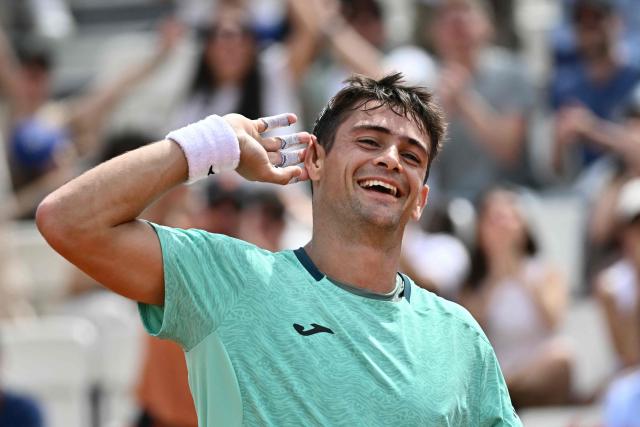 Argentine's Mariano Navone celebrates after winning the first set against Canada's Felix Auger Aliassime during the ATP Rome Open tennis tournament at Foro Italico in Rome on May 9, 2026. (Photo by Filippo MONTEFORTE / AFP)