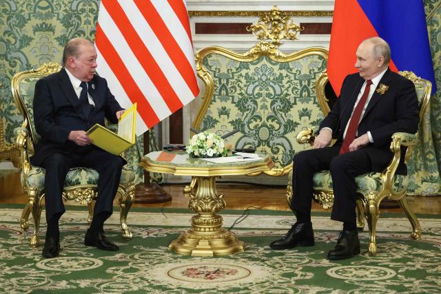Russia's President Vladimir Putin and Malaysia's King Sultan Ibrahim hold a meeting at the Kremlin in Moscow on May 9, 2026. (Photo by MAXIM SHIPENKOV / POOL / AFP)