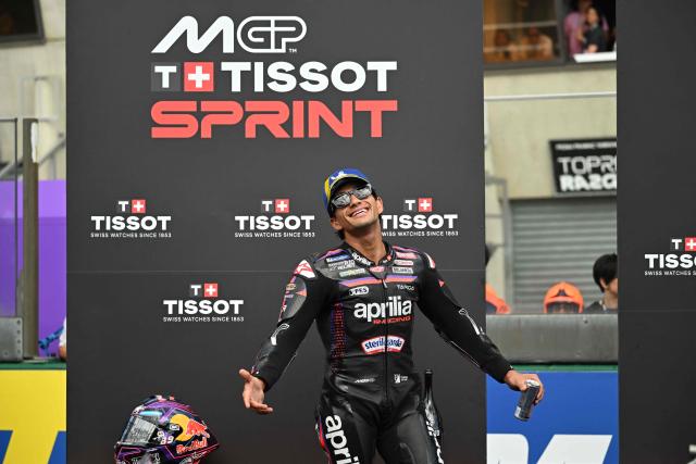 Aprilia Racing's Spanish rider Jorge Martin celebrates on the podium after winning the Moto GP Grand Prix of France Sprint race at Le Mans, northwestern France, on May 9, 2026. (Photo by Loic VENANCE / AFP)
