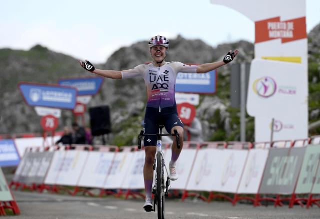 Overall leader team UAE ADQ's Spanish rider Paula Blasi Cairol celebrates winning the 2026 La Vuelta Femenina cycling tour of Spain, at Alto de l'Angliru, on May 9, 2026. (Photo by Miguel RIOPA / AFP)