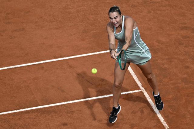 Belarus' Aryna Sabalenka hits a return to Romania's Sorana Cirstea during the WTA Rome Open tennis tournament at Foro Italico in Rome on May 9, 2026. (Photo by Tiziana FABI / AFP)