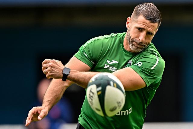 Montauban's French head coach Sebastien Tillous-Borde gives the ball during warm-up ahead of during the French Top 14 rugby union match between Montpellier Herault Rugby and US Montauban at the Yves-du-Manoir Stadium in Montpellier, southern France on May 9, 2026. (Photo by Gabriel BOUYS / AFP)