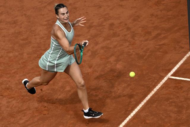 Belarus' Aryna Sabalenka hits a return to Romania's Sorana Cirstea during the WTA Rome Open tennis tournament at Foro Italico in Rome on May 9, 2026. (Photo by Tiziana FABI / AFP)