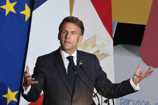 France's President Emmanuel Macron addresses the guests during the inauguration ceremony of the new Senghor University campus in Borg el-Arab, near in the Mediterranean coastal city of Alexandria on May 9, 2026. France's President Emmanuel Macron on May 9, embarked on a visit to Africa aimed at renewing France's engagement with the continent after years of strained ties with former French speaking colonies, also travelling to Egypt, Ethiopia and Kenya. (Photo by Ludovic MARIN / AFP)
