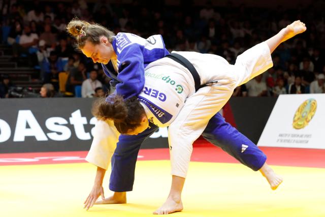 Germany's Miriam Butkereit and France's Clemence Eme compete in the women's under 70 kg final bout at the Astana Grand Slam judo tournament in Astana on May 9, 2026. (Photo by STANISLAV FILIPPOV / AFP)