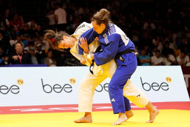 Germany's Miriam Butkereit and France's Clemence Eme compete in the women's under 70 kg final bout at the Astana Grand Slam judo tournament in Astana on May 9, 2026. (Photo by STANISLAV FILIPPOV / AFP)