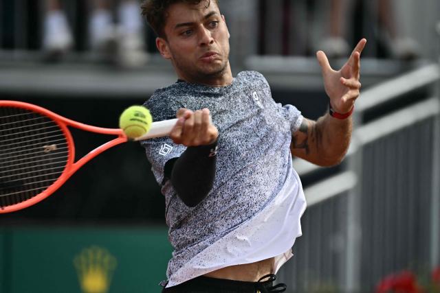 Italy's Flavio Cobolli hits a return to French Terence Atman during the ATP Rome Open tennis tournament at Foro Italico in Rome on May 9, 2026. (Photo by Filippo MONTEFORTE / AFP)