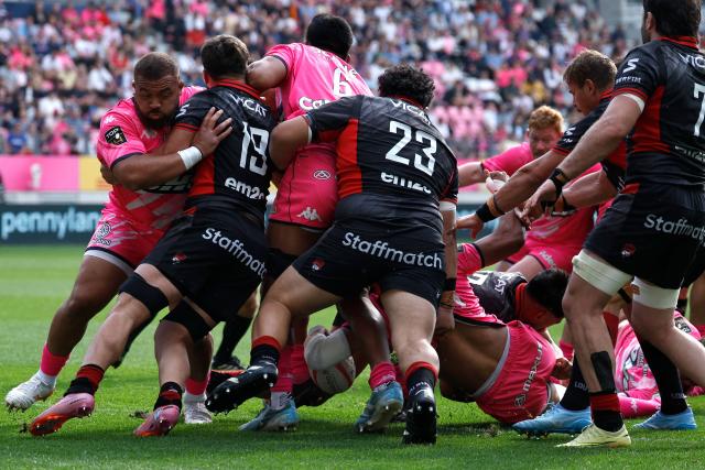 Stade Français' French lock Pierre-Henri Azagoh (bottom) scores a try during the French Top 14 rugby union match between Stade Francais and Lyon Olympique Universitaire Rugby at the Jean Bouin Stadium in Paris on May 9, 2026. (Photo by SIMON WOHLFAHRT / AFP)