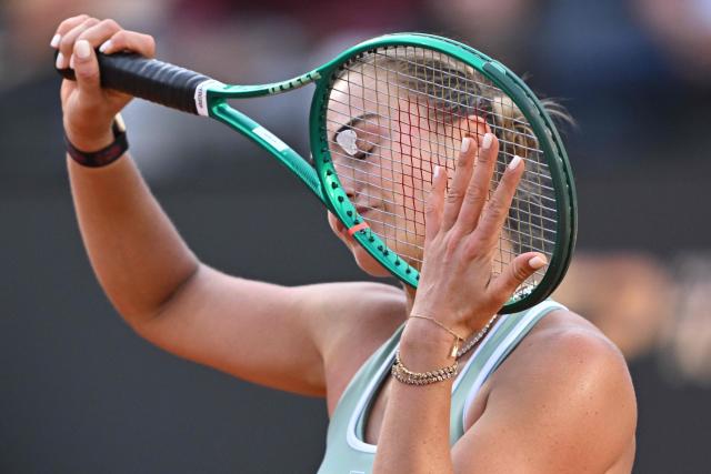 TOPSHOT - Belarus' Aryna Sabalenka reacts during her match against Romania's Sorana Cirstea during the WTA Rome Open tennis tournament at Foro Italico in Rome on May 9, 2026. (Photo by Tiziana FABI / AFP)