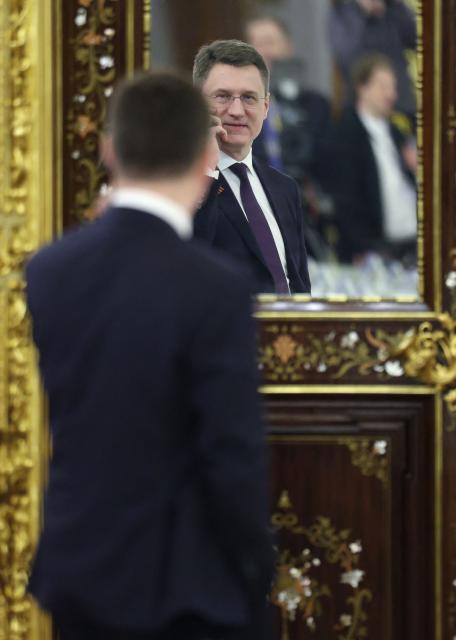 Russia's Deputy Prime Minister Alexander Novak speaks on the phone before a meeting between Russian President and Laotian President at the Kremlin in Moscow on May 9, 2026. (Photo by Ramil Sitdikov / POOL / AFP)