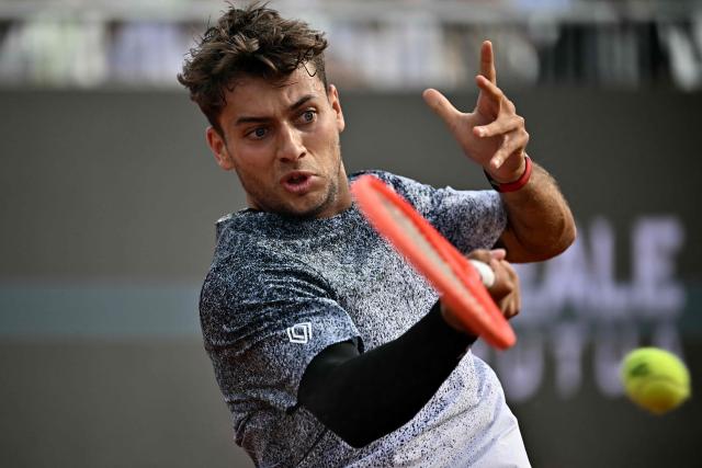 Italy's Flavio Cobolli hits a return to French Terence Atman during the ATP Rome Open tennis tournament at Foro Italico in Rome on May 9, 2026. (Photo by Filippo MONTEFORTE / AFP)
