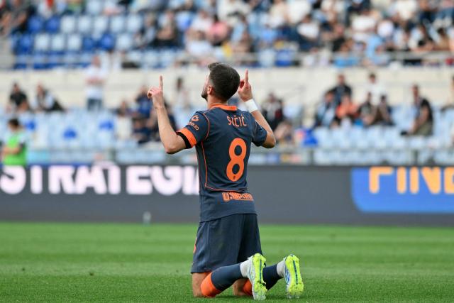Inter Milan's Croatian midfielder #08 Petar Sucic celebrates after scoring his team's second goal during the Italian Serie A football match between Lazio and InterMilan at the Olympic stadium in Rome on May 9, 2026. (Photo by Alberto PIZZOLI / AFP)
