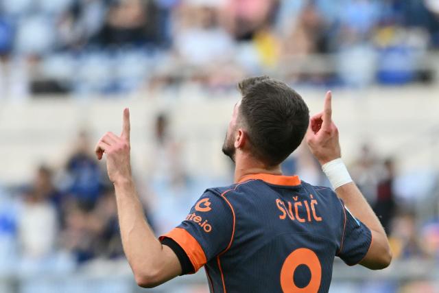 Inter Milan's Croatian midfielder #08 Petar Sucic celebrates after scoring his team's second goal during the Italian Serie A football match between Lazio and InterMilan at the Olympic stadium in Rome on May 9, 2026. (Photo by Alberto PIZZOLI / AFP)