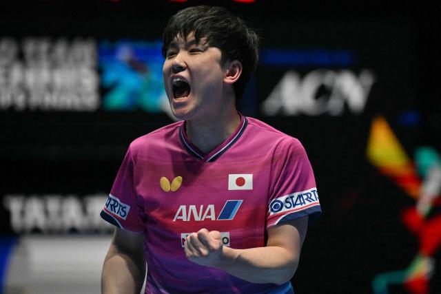 Japan's Tomokazu Harimoto reacts while playing against Taiwan's Lin Yun-ju during their Men's Teams semi-final match at the ITTF World Table Tennis Championships in Wembley Arena, west London on May 9, 2026. (Photo by Glyn KIRK / AFP)